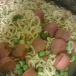 Indomie Noodles With Hotdogs And Peas