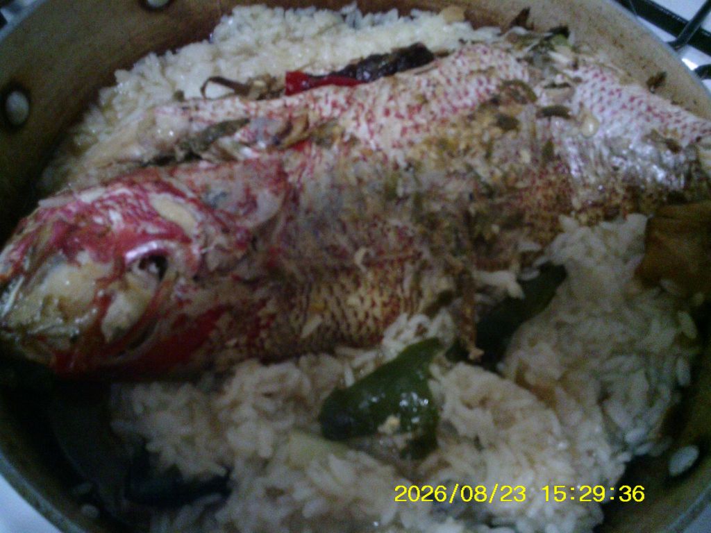 Asian Broiled Or Baked In Oven Whole Fish With Rice Shitake Mushrooms And Wakeme Seaweed